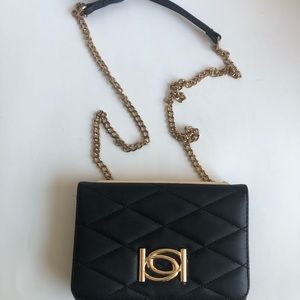 Bebe quilted purse black with metal details -used